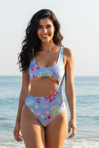 Maillot de bain 1 piece transbronzant bleu motifs colores Les Petites Tricheuses avec découpe asymétrique sculptante
